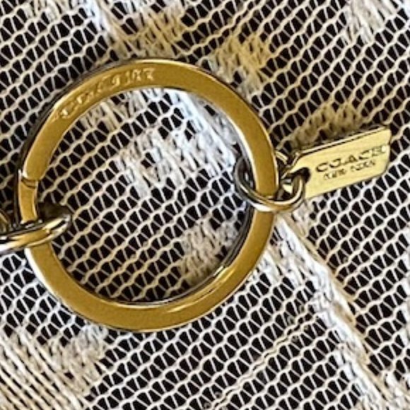Coach Embossed Signature Logo Open Oval Shape Silver Keychain - Picture 5 of 13